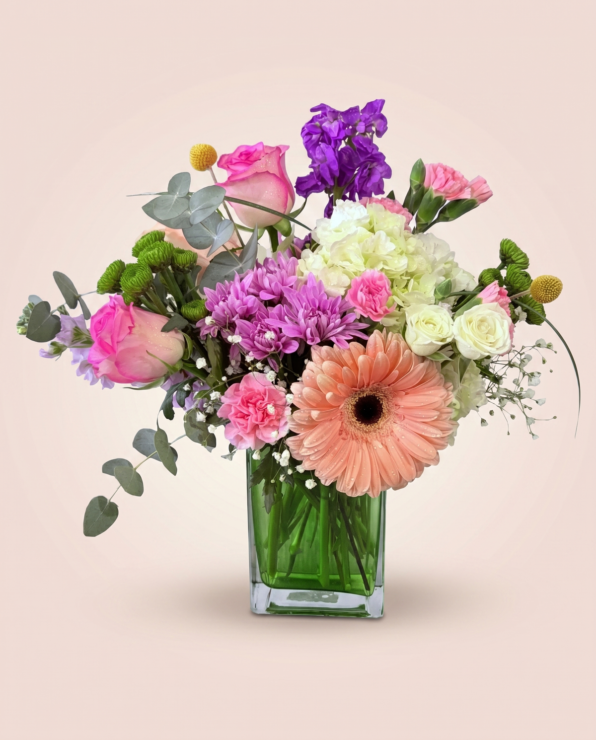 Berry Blush Bouquet — pink and purple roses, carnations, and asters in a glass vase