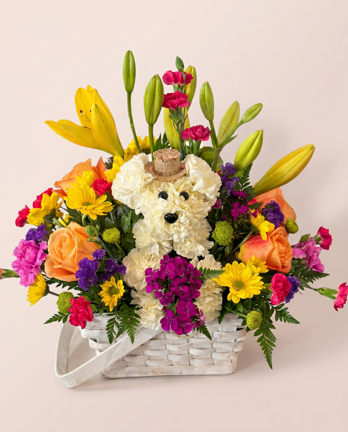 Birthday Bear Blooms — floral teddy bear in a party hat with bright blooms in a basket