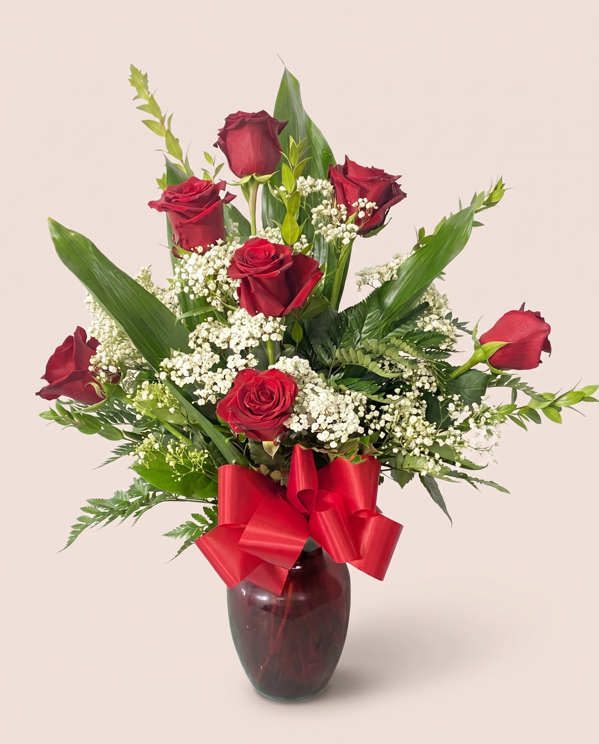Classic Red Romance — a dozen red roses with white baby's breath in a vase