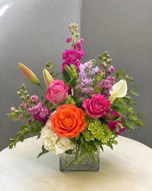 Standard Coral Lily Garden bouquet with fewer flowers and more greenery