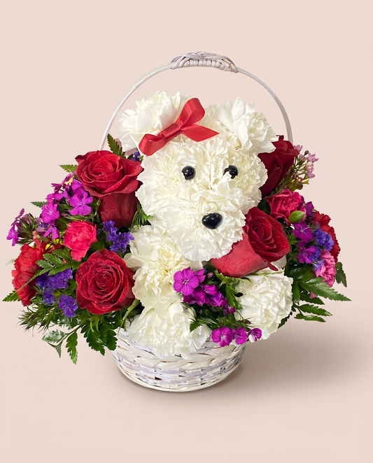 Puppy Love Blooms — floral puppy made of white carnations with red roses in a basket