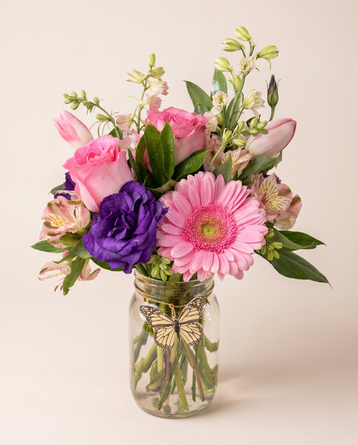 Butterfly Garden Bouquet — pink gerbera daisies and roses with a butterfly accent
