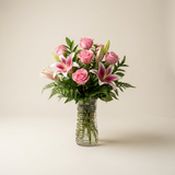 Pink Roses and Stargazer Lilies in a Ribbed Glass Vase for Birthdays and Anniversaries as shown