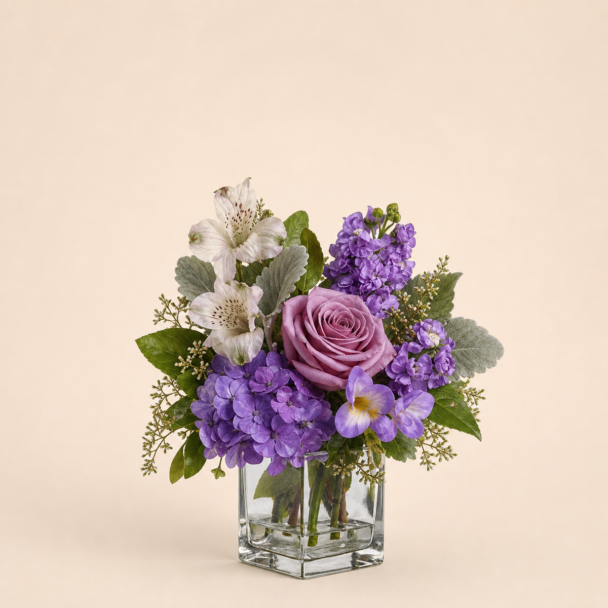 Sugar Sweet Blooms smaller Standard lavender rose, purple hydrangea and white alstroemeria fresh flower arrangement in a clear square glass vase