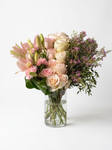 Pink Rose Lily Carnation Bouquet With Purple Accents In Glass Vase as shown